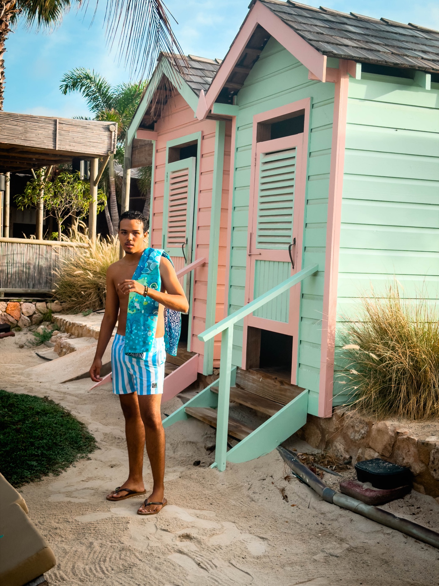 BRO Men's Fashion — swimwear look beside the pastel cabanas