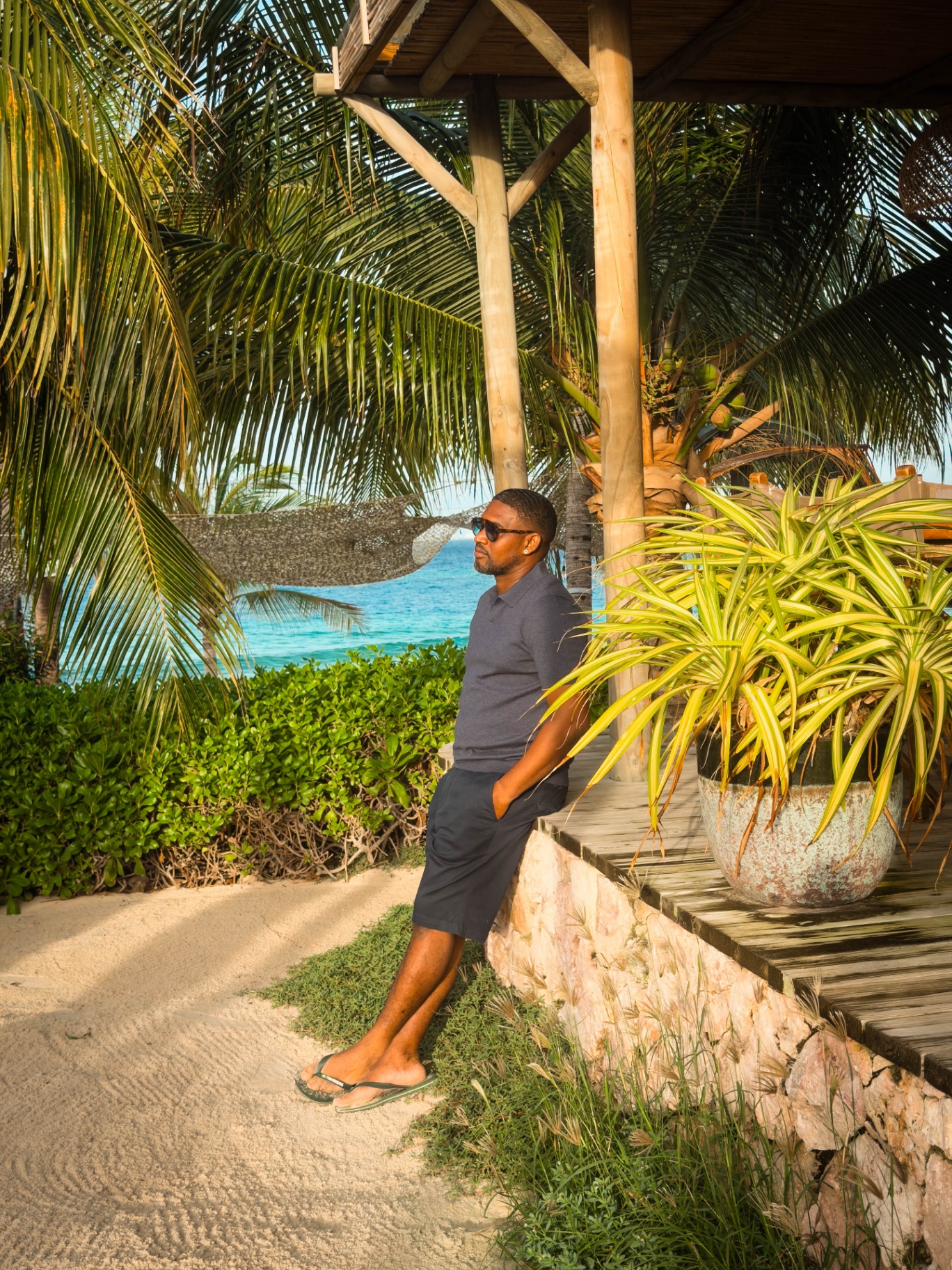 BRO Men's Fashion — navy polo at the beach bar